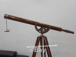Nautical Vintage Marine Telescope With Brown Wooden Floor Tripod Stand