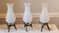 Three white vintage MCM plastic wooden-legged tripod lamps rare shape