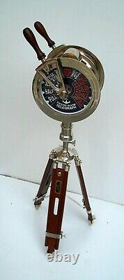 Vintage brass telegraph navy ship engine room with floor wooden tripod stand
