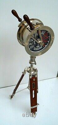 Vintage brass telegraph navy ship engine room with floor wooden tripod stand