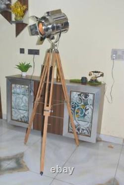 Vintage style chrome spotlight lamp on wooden tripod base floor lamp lighting