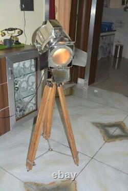 Vintage style chrome spotlight lamp on wooden tripod base floor lamp lighting