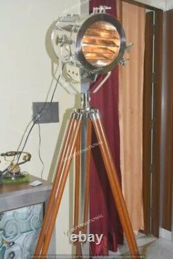 Vintage style decorative chrome floor search light with brown wooden tripod stan