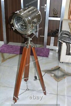 Vintage style decorative chrome floor search light with brown wooden tripod stan