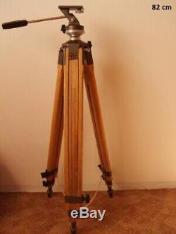 Vintage wooden extendable tripod for camera with head